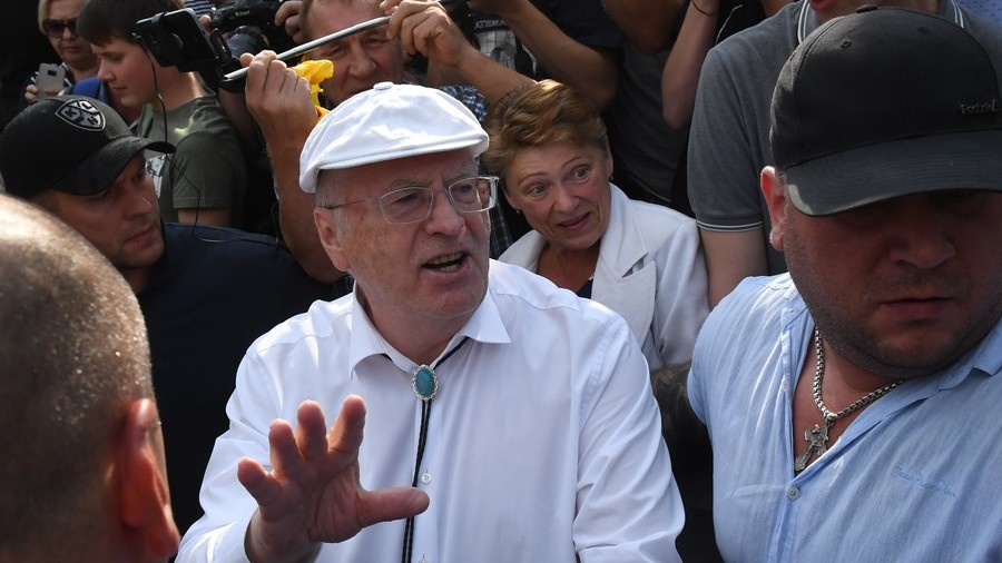 WATCH Russian Lib Dem leader thrown to the ground after brawl with protester