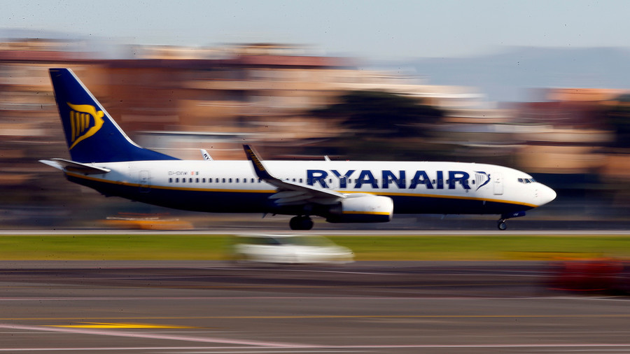 Tussle on the tarmac: Desperate passenger tries to fight his way onto missed flight (PHOTOS)