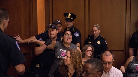 Protester removed from the Senate hearing on the nomination of Brett Kavanaugh to the US Supreme Court © Alex Wroblewski