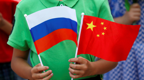 Russia and China ditching dollar for national currencies payment system to avoid sanctions  