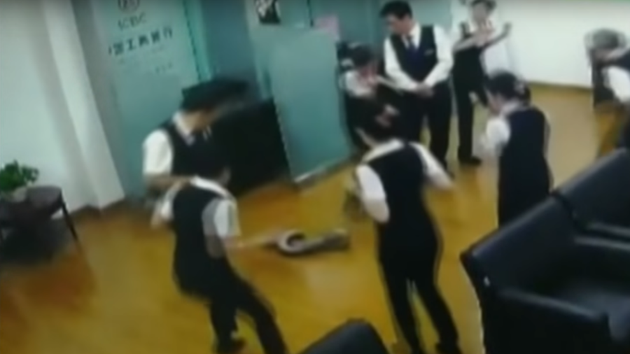 Ssstrange customer: Huge python plunges through bank ceiling, terrifies staff (VIDEO)
