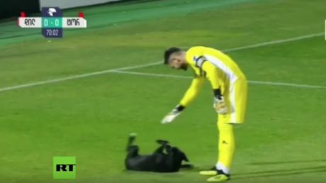 Footballer bamboozles opposition by dumping injured teammate to pop up & score winner (VIDEO)