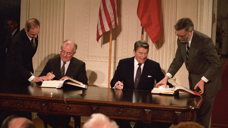 Soviet President Mikhail Gorbachev and US President Ronald Reagan sign the INF treaty, December 8, 1987 Â© Reuters