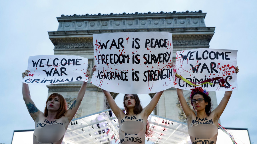 ‘Welcome War Criminals’: FEMEN activists blast world leaders ahead of Paris WW1 commemorations