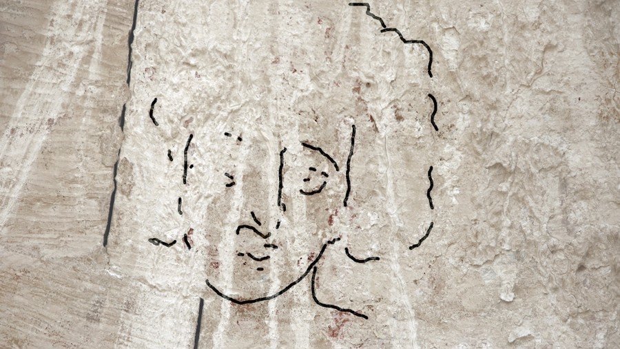 Curly headed & clean shaven: Long lost depiction of Jesus offers totally different portrayal