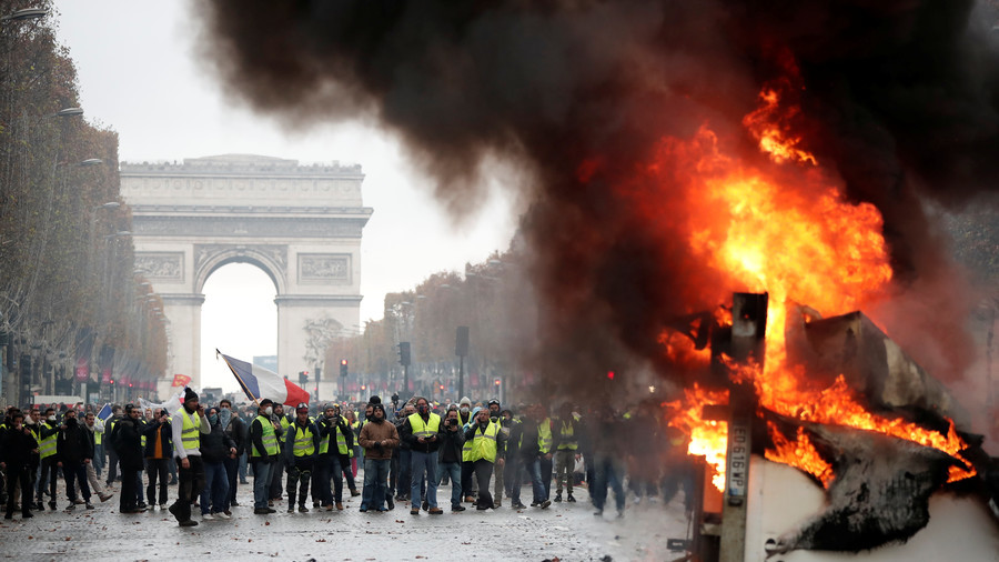 Battlefield Paris Police Hit Protesters With Tear Gas As