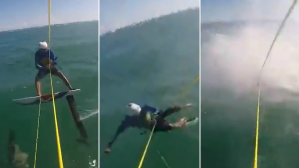Watch Australian surfer crash into shark during kite foiling race