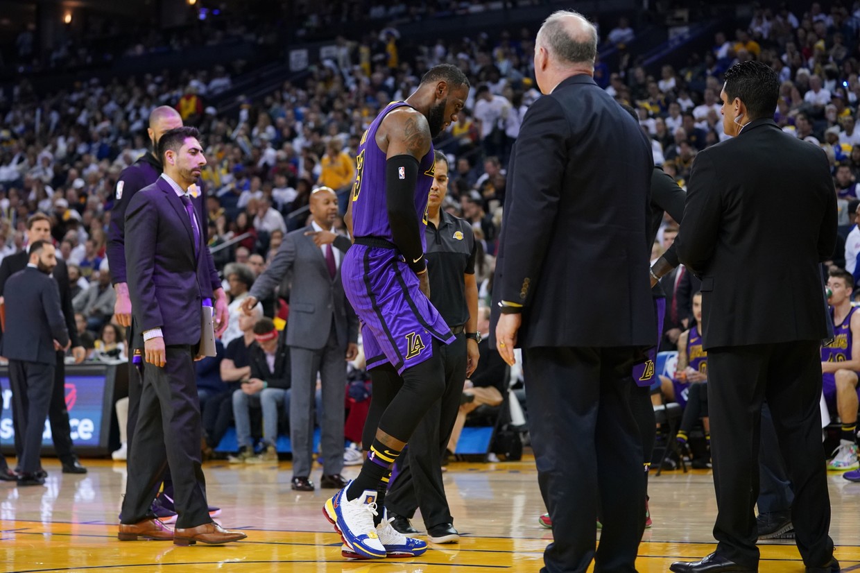 LeBron James watches from courtside as Lakers are beaten by Clippers