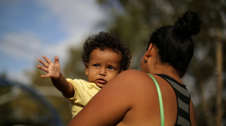 Mike Pence sparks QAnon theories after deleting tweet featuring badge