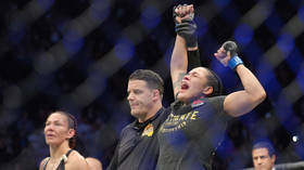 Amanda Nunes stuns Cris Cyborg to become first female two-weight champ at UFC 232