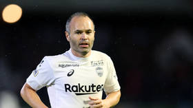 Iniesta apologizes after blackface backlash, but keeps photos online