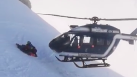 Pilot shows off nerves of steel with incredible close-call Alpine rescue (VIDEOS)