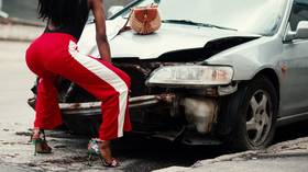 Traffic twerk: Dancing girls create a stir atop moving car on highway (VIDEOS)