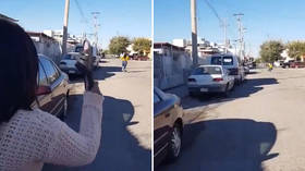 Too good to be true? Internet split as mother nails daughter with impossible slipper shot (VIDEO)