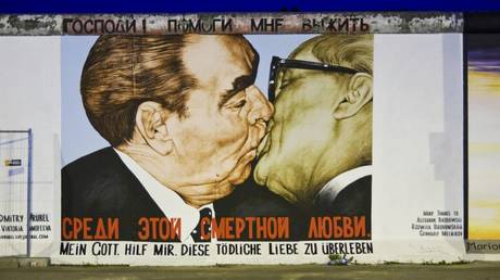 A segment of the graffiti painted wall at the East Side Gallery in Berlin © Christian Reister / Global Look Press
