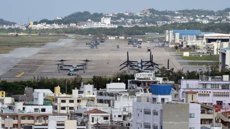 US Marine V-22 Osprey aircraft sit on the tarmac at the Futenma base © AFP /Toru Yamanaka