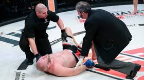 ‘Pray he has no plans for children’: Internet recoils at below-the-belt kick on Russian MMA fighter