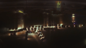 Cars line up in shape of HUGE Kalashnikov rifle in Russian holiday flash mob (VIDEO)