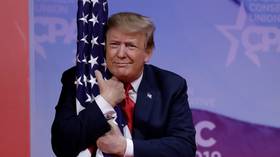 'Can the flag sue for harassment?' Twitter goes bananas after Trump hugs American flag