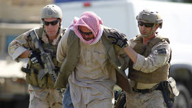 FILE PHOTO: US Navy SEALs practice apprehending a prisoner at Fort Pierce, Florida © Reuters / Joe Skipper