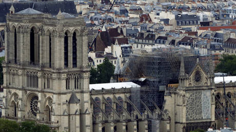 Notre Dame cathedral clad in scaffolding after last month's devastating fire © Reuters / Gonzalo Fuentes
