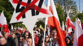 ‘No obligations’: Polish nationalists march against Holocaust compensation law (PHOTOS)