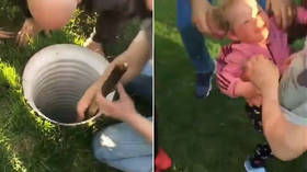 Hero kid lowered head-first into water-filled pipe to rescue trapped little girl in dramatic VIDEO