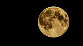 Cosmic black eye? Massive punch from dwarf planet may explain why our moon is so weird