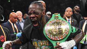 Deontay Wilder celebrates after knocking out Dominic Breazeale © Reuters / Sarah Stier
