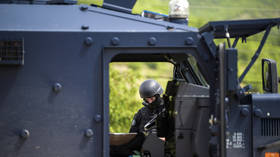 Russian member of UN mission detained, reportedly injured in Kosovo raids