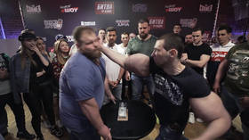 Clash of the titans! Russian slap champ 'The Dumpling' takes on foot-long bicep guy 'Bazooka Arms'
