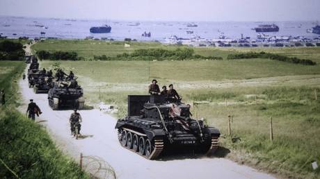 Handout photo of a Cromwell tank leading a British Army column inland from Gold Beach after landing on D-Day in Ver-sur-Mer © Reuters