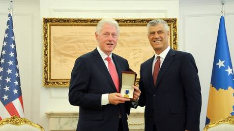 Former US President Bill Clinton receives medal from 'President of Kosovo' and former KLA militant Hashim Thaci, June 11, 2019