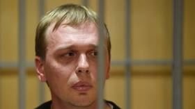 Court puts Russian journalist charged with drug dealing under house arrest