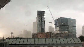 'Absolute chaos:' 1 killed as crane smashes into Dallas apartment block due to storm (VIDEOS)