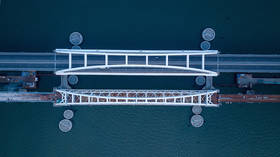 Connecting Russia: First railroad span across Crimean Bridge complete