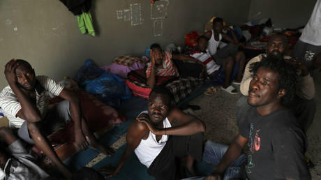 At least 40 killed in alleged airstrike at migrant detention center near Tripoli – reports