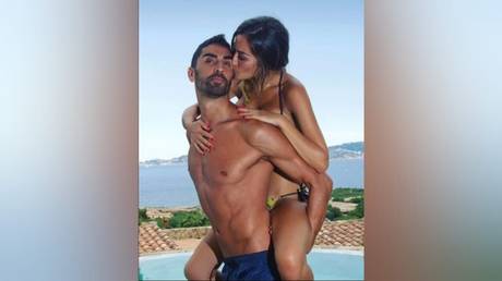 Swim hero: Retired Italian Olympic star rescues drowning newlywed who fell off inflatable unicorn 