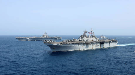 Sailor missing from US aircraft carrier rehearsing strike on Iran’s doorstep
