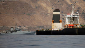 FILE PHOTO. A British Royal Navy vessel guards the seized oil tanker Grace 1.