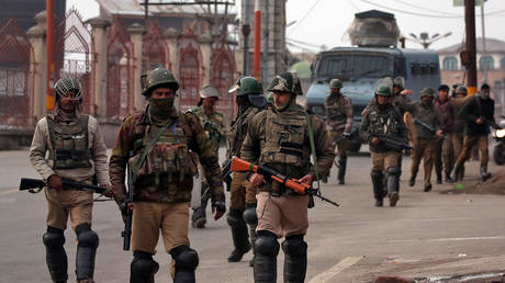 FILE PHOTO: Indian Central Reserve Police Force (CRPF) personnel patrol a street in downtown Srinagar, Kashmir, on February 23, 2019.