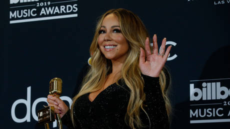 Diet-conscious Mariah Carey inks lucrative deal with...Walkers crisp brand