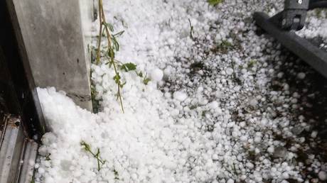 WATCH massive Madrid hail storm flood city streets and wash away CARS