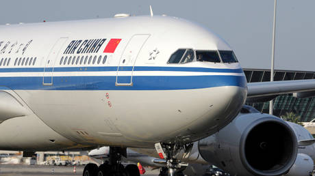 Terrified passengers and crew evacuated as Airbus jet catches fire at Beijing airport (VIDEOS)