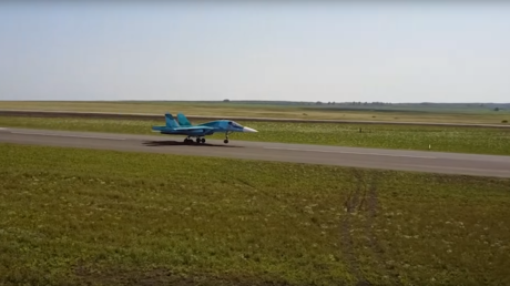 WATCH supersonic Su-34 fighter-bombers and An-26 transports land on highway in Russia