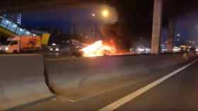 3 injured as Tesla goes up in flames & explodes on Moscow freeway (VIDEOS)