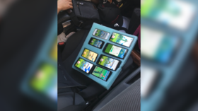 Onyx-pected: Cop catches driver playing Pokemon Go on 8 phones at the same time