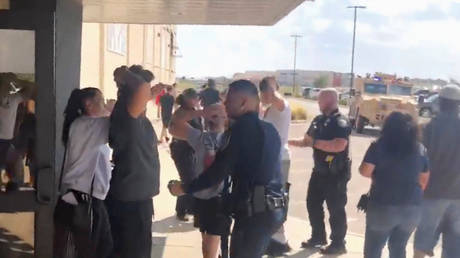 People are evacuated from Cinergy Odessa cinema following a shooting in Odessa, Texas, U.S. in this still image taken from a social media video August 31, 2019. © Rick Lobo via REUTERS