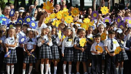 Russian pupils line up as they celebrate the start of the school year © RIA Novosti / Vitaly Timkiv