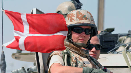 FILE PHOTO: Danish soldiers conduct a patrol in southern Iraq